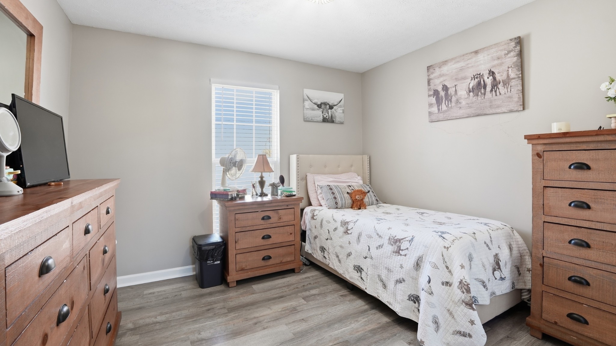 32 McGee Road McMinnville, TN 37110 - Photo 18 of 56 a bedroom with a bed and a dresser