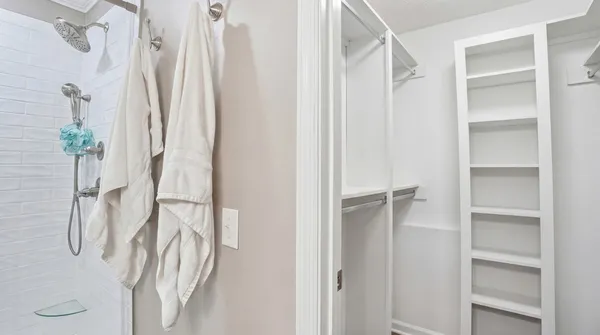 a bathroom with a sink vanity and mirror