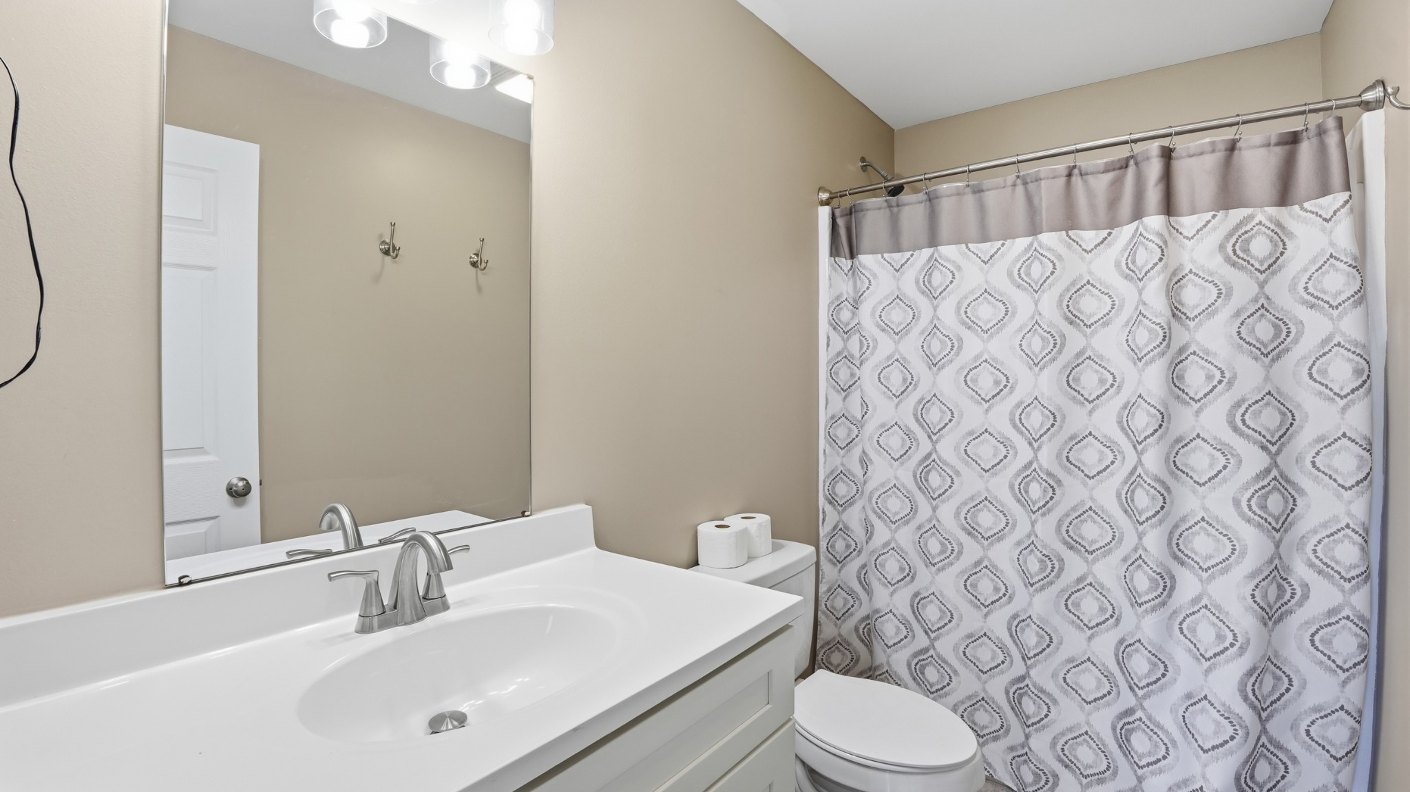 32 McGee Road McMinnville, TN 37110 - Photo 33 of 56 a bathroom with a sink and a mirror