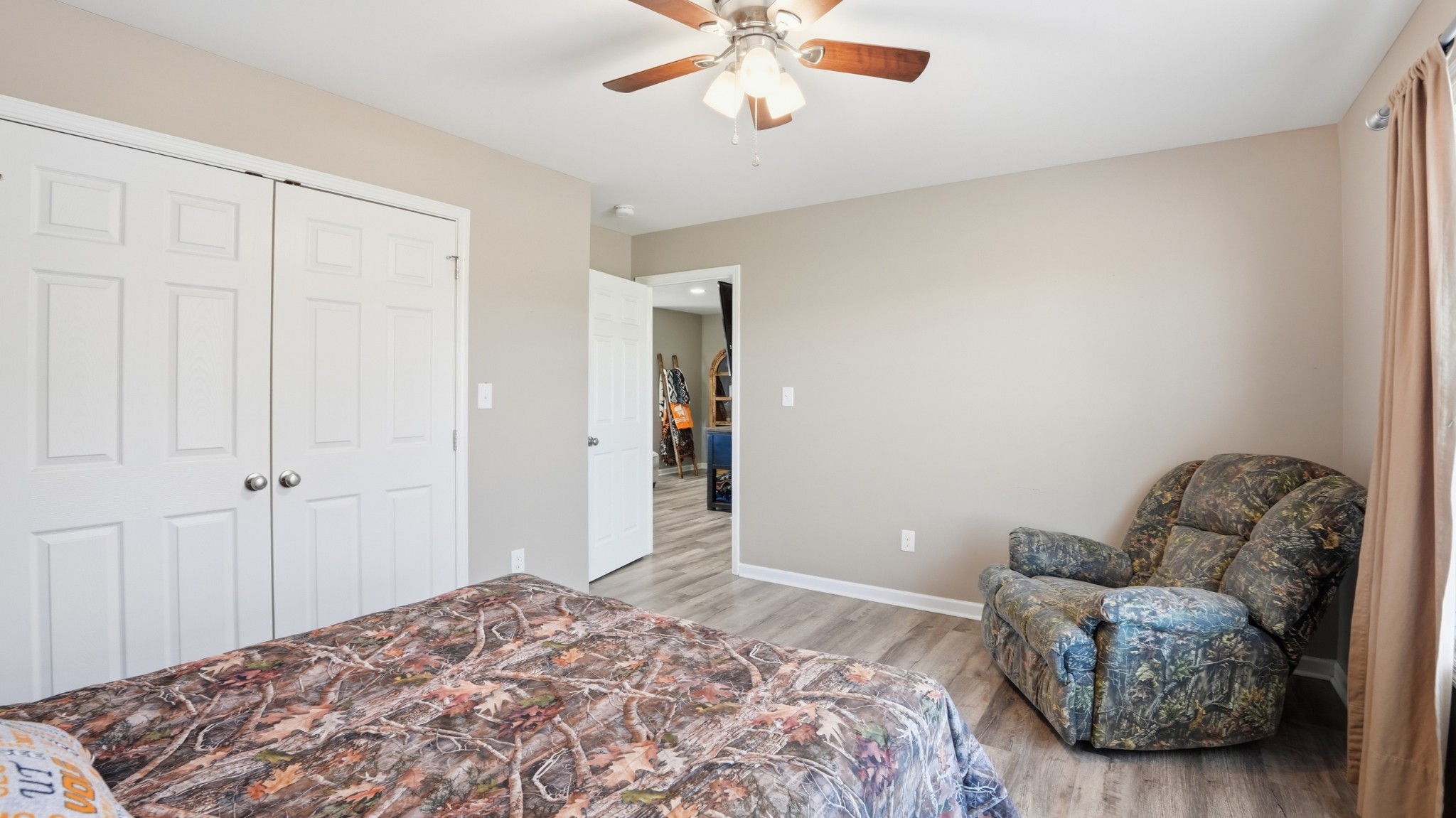32 McGee Road McMinnville, TN 37110 - Photo 35 of 56 a bedroom with a bed couches and view of kitchen