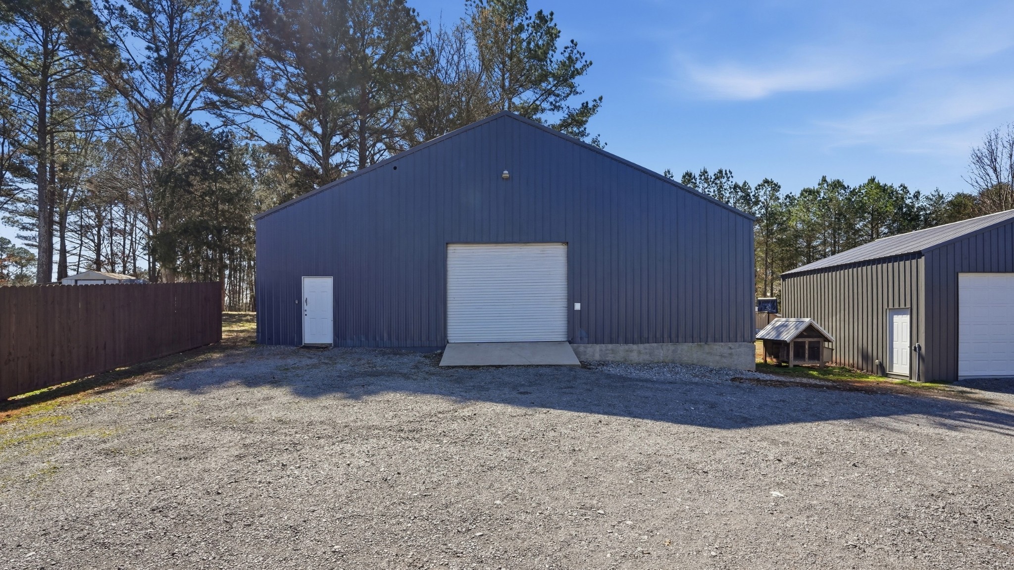 32 McGee Road McMinnville, TN 37110 - Photo 45 of 56 a backyard of a house with table and chairs