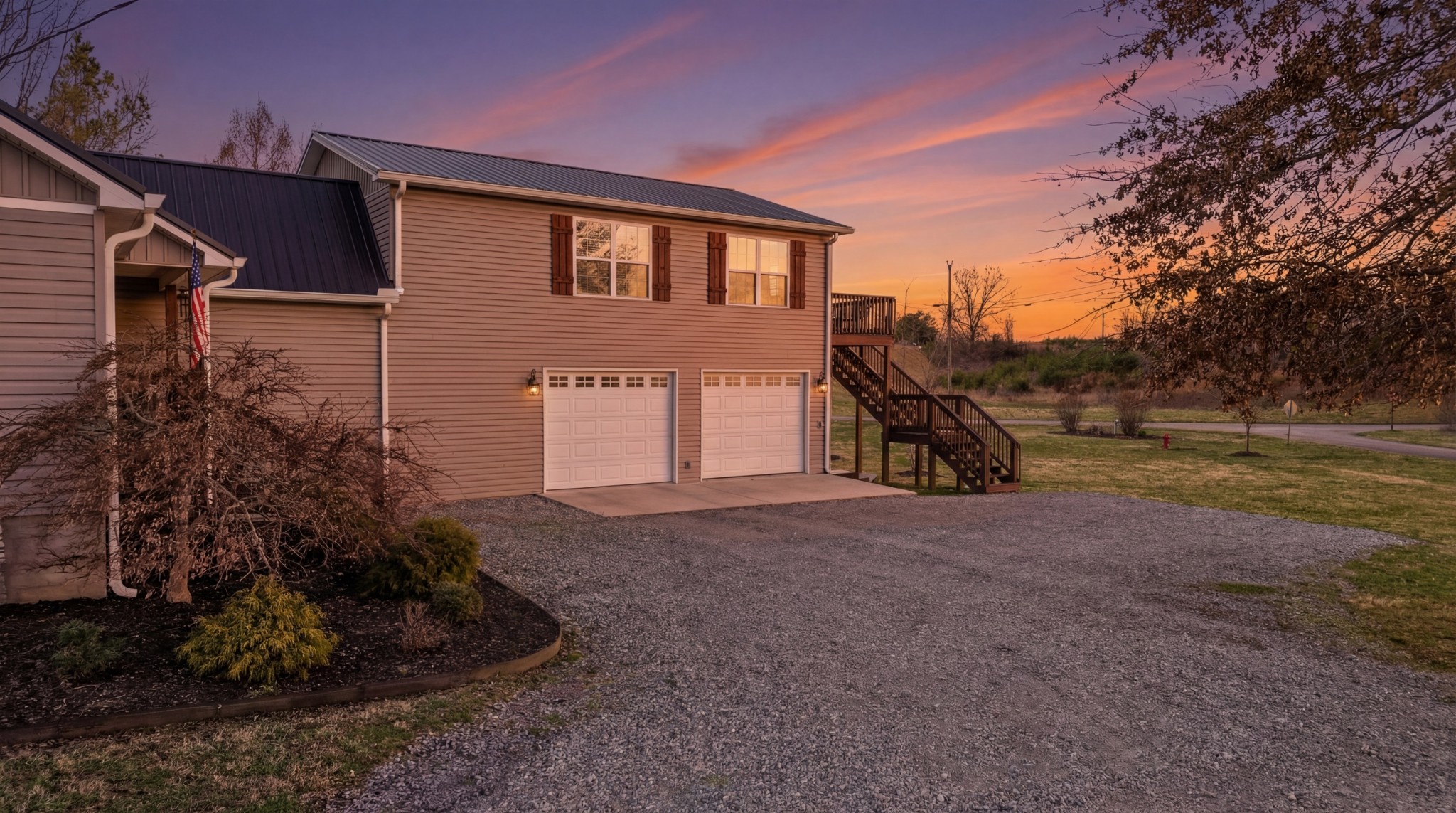 32 McGee Road McMinnville, TN 37110 - Photo 50 of 56 a front view of a house with a yard and garage
