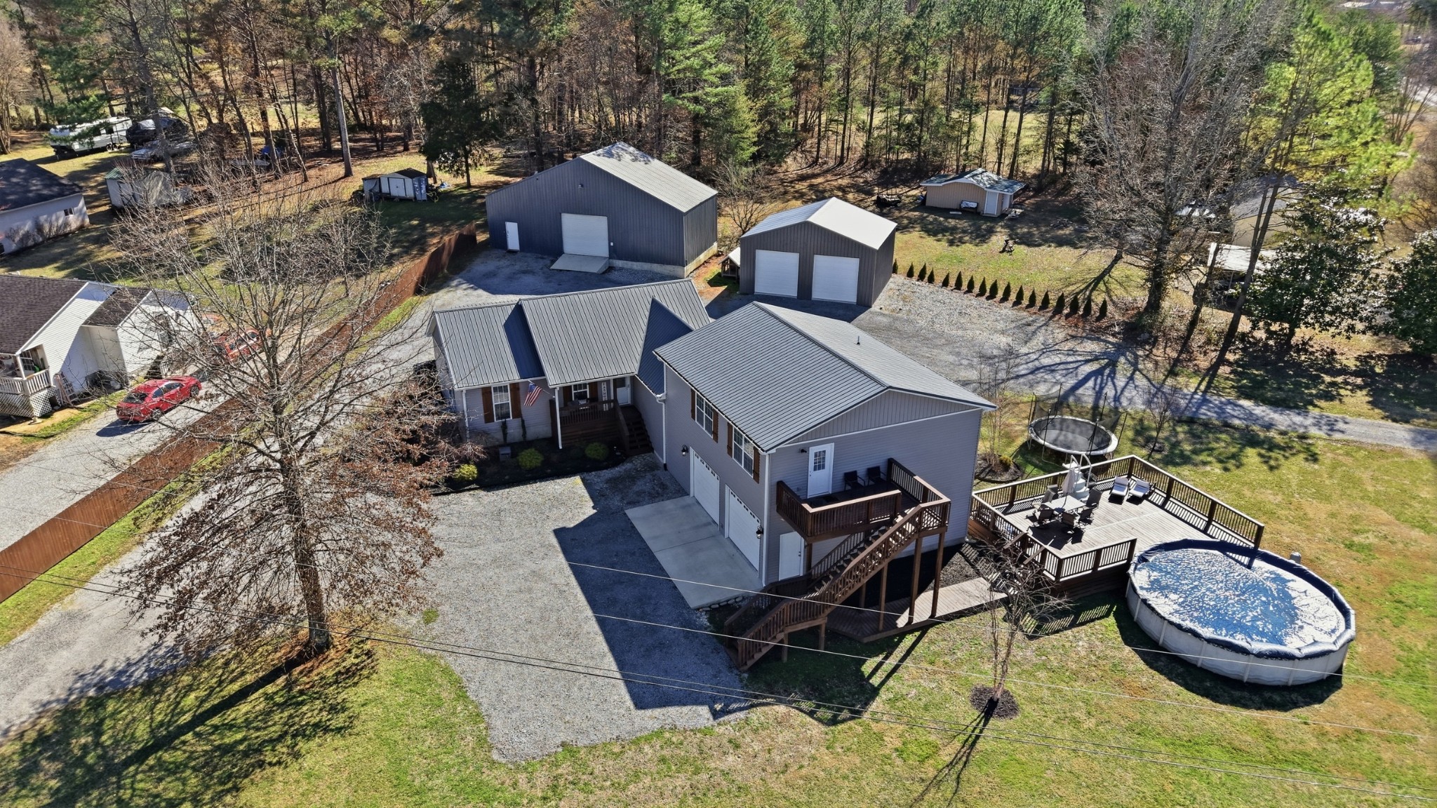 32 McGee Road McMinnville, TN 37110 - Photo 51 of 56 a view of a house with backyard and sitting area