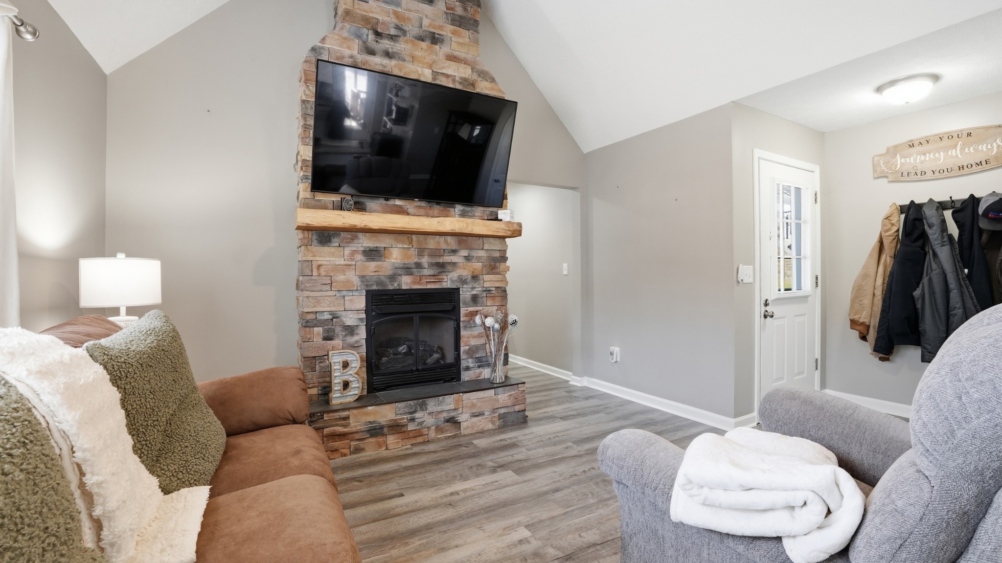 32 McGee Road McMinnville, TN 37110 - Photo 9 of 56 a living room with furniture and a flat screen tv