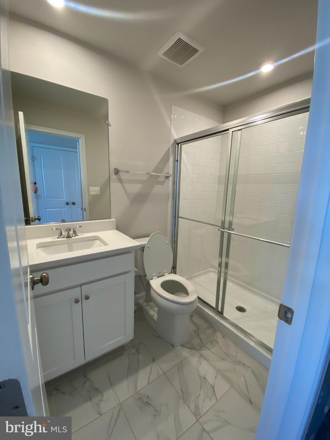 58 Coolidge Avenue Ranson, WV 25438 - Photo 21 of 30 Modern bathroom with sleek finishes.