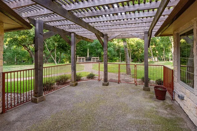 a view of a room with porch and wooden floor