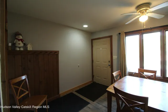 a workspace with furniture and window