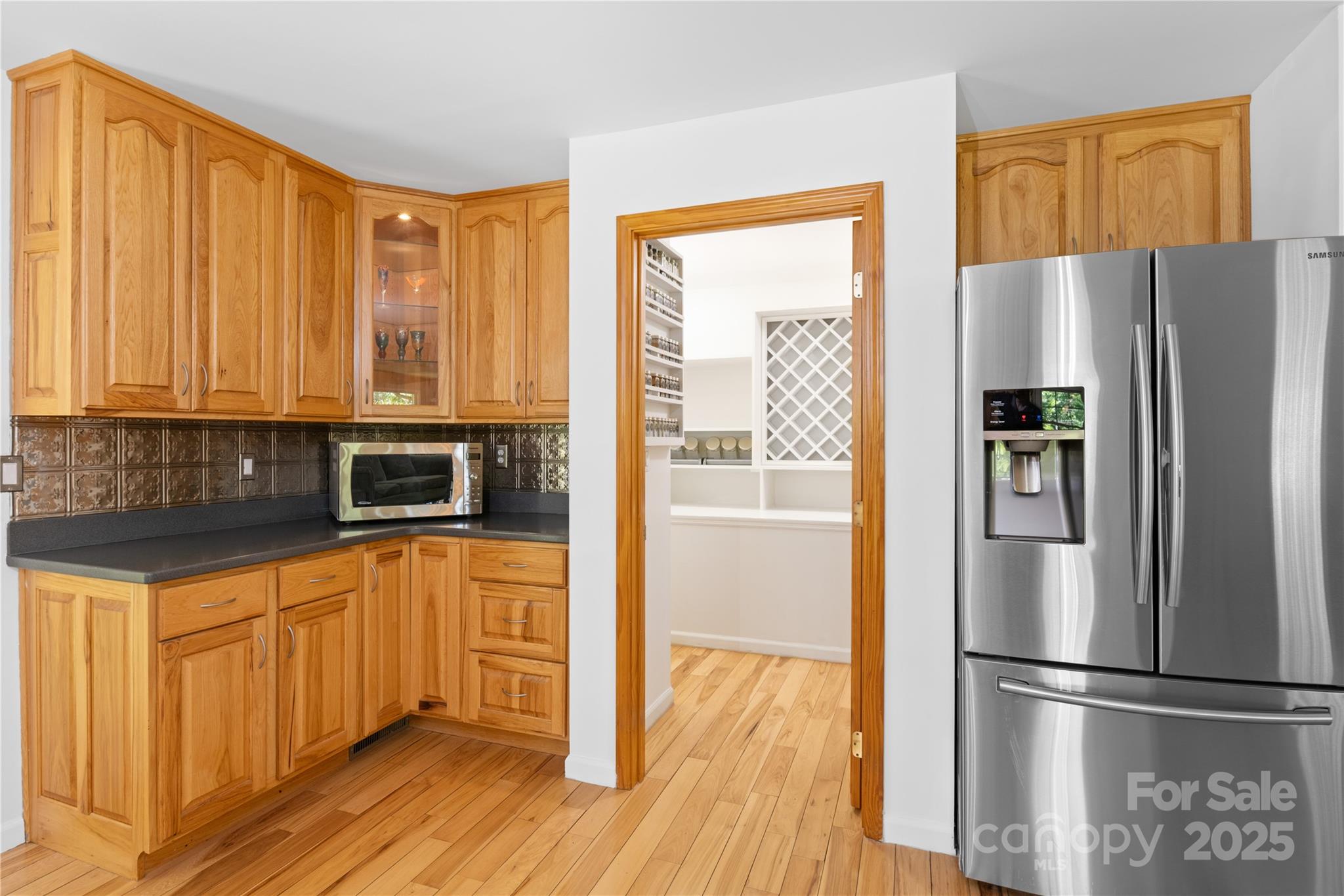 3 Northwood Road Asheville, NC 28804 - Photo 18 of 48 a kitchen with stainless steel appliances granite countertop a refrigerator and a stove top oven