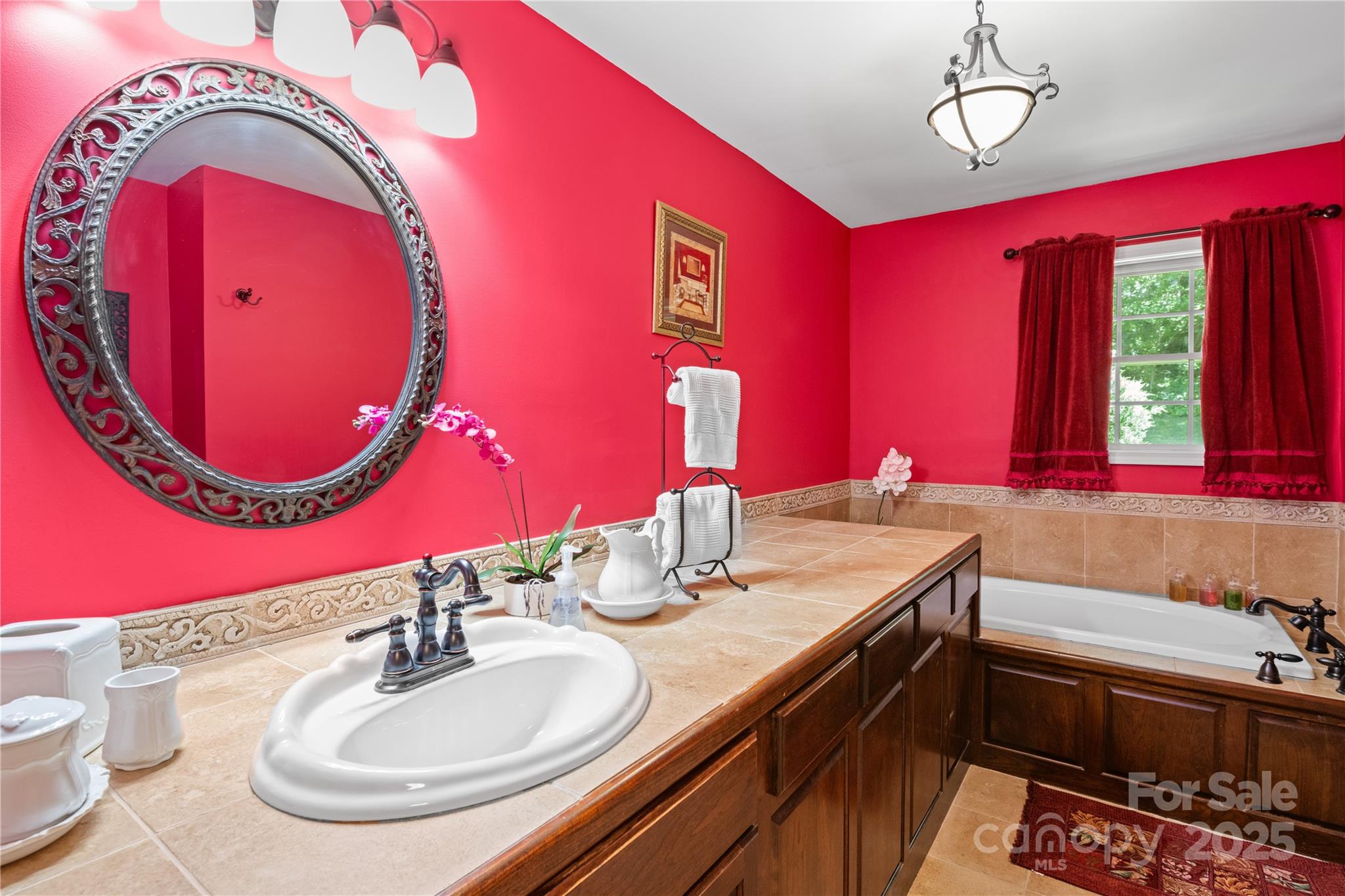 3 Northwood Road Asheville, NC 28804 - Photo 27 of 48 a bathroom with a sink and a mirror