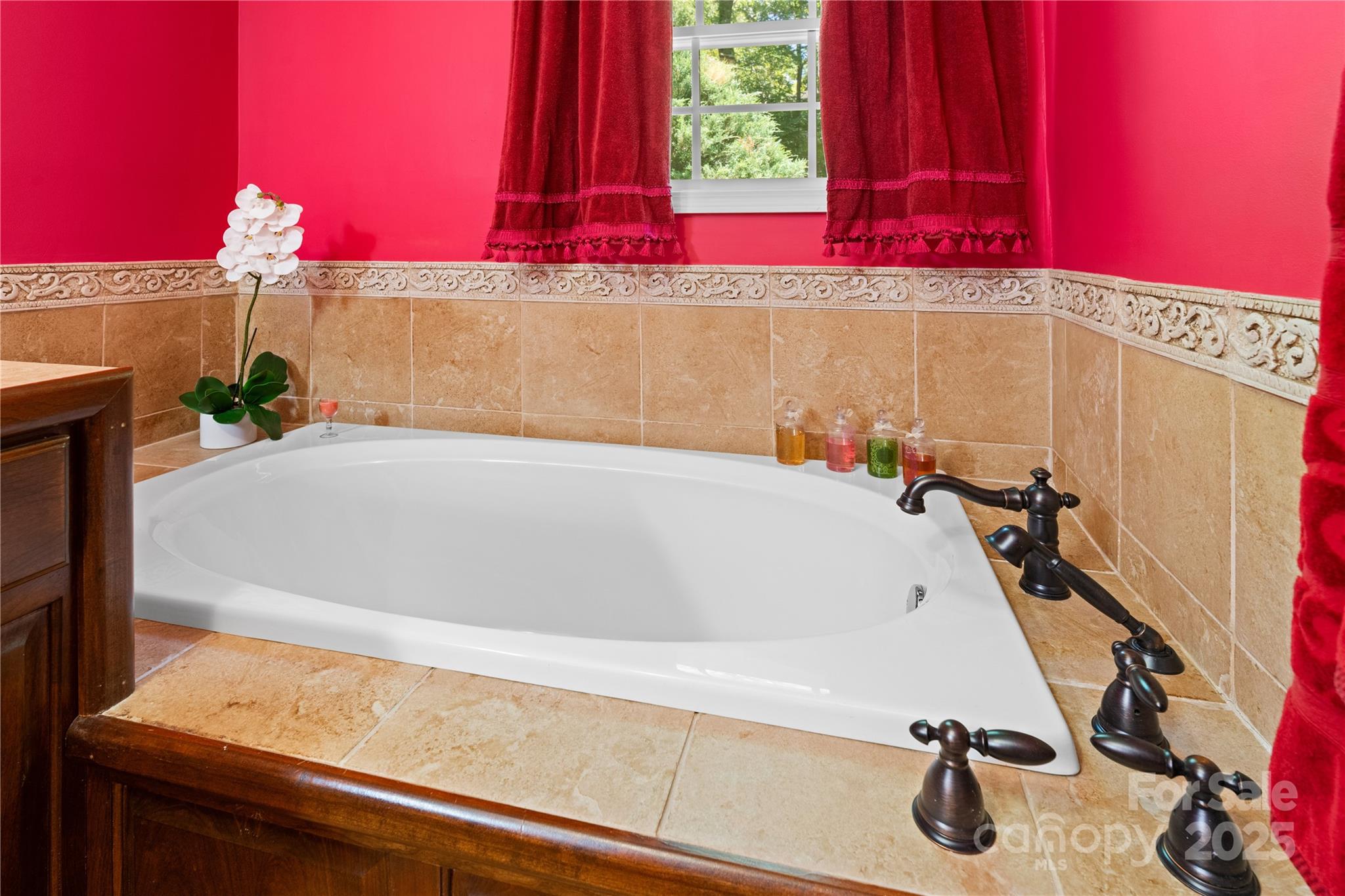 3 Northwood Road Asheville, NC 28804 - Photo 28 of 48 a bathroom with a tub and a sink