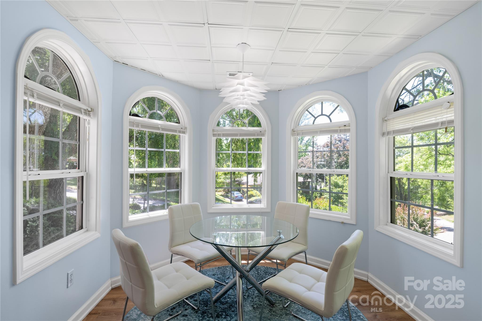 3 Northwood Road Asheville, NC 28804 - Photo 31 of 48 a view of a dining room with furniture large windows and wooden floor