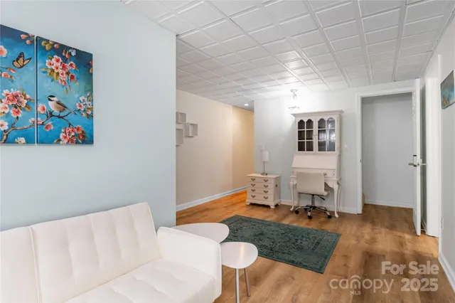 a bathroom with a tub sink and a mirror