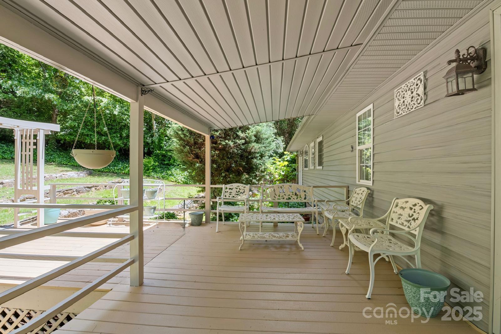 3 Northwood Road Asheville, NC 28804 - Photo 42 of 48 a dining room with furniture and wooden floor