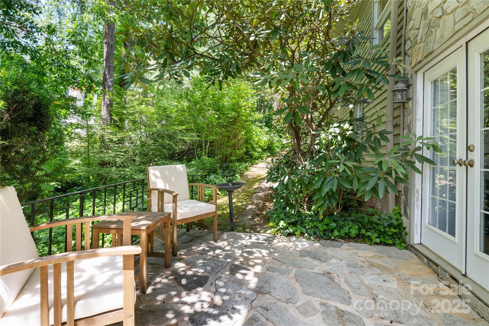 3 Northwood Road Asheville, NC 28804 - Photo 45 of 48 a view of a chairs and table in the patio