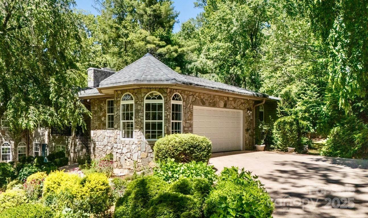 3 Northwood Road Asheville, NC 28804 - Photo 5 of 48 a front view of a house with a yard