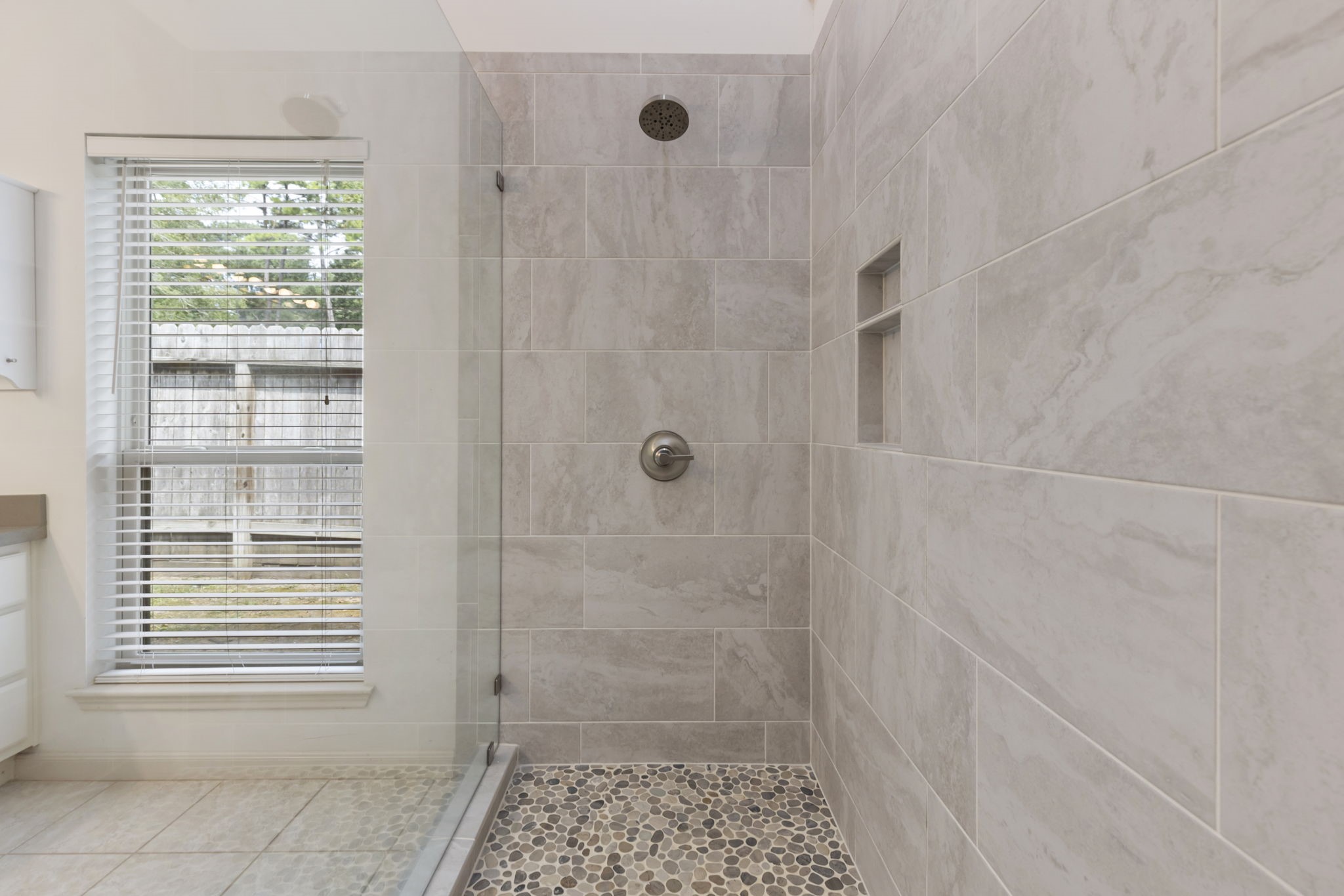 59 Fire Flicker Place Spring, TX 77381 - Photo 21 of 37 Another view of the large and updated shower.