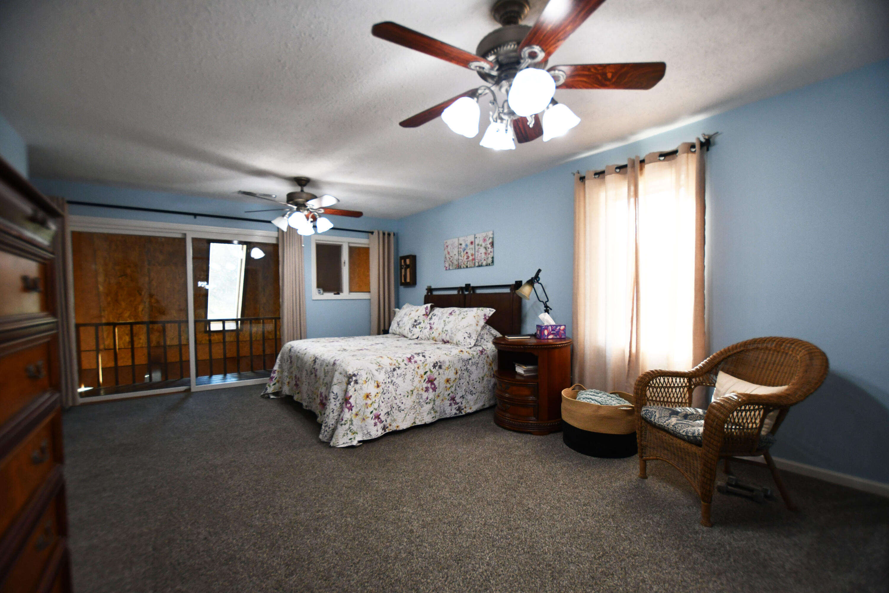 820 Sweet Lick Road Ravenna, KY 40472 - Photo 39 of 73 Spacious owner’s suite with private study, full bathroom, and a walk-out balcony overlooking the solarium!