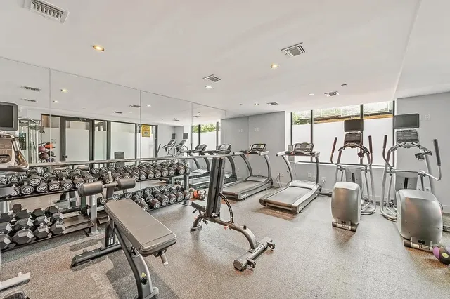 a view of a room with gym equipment