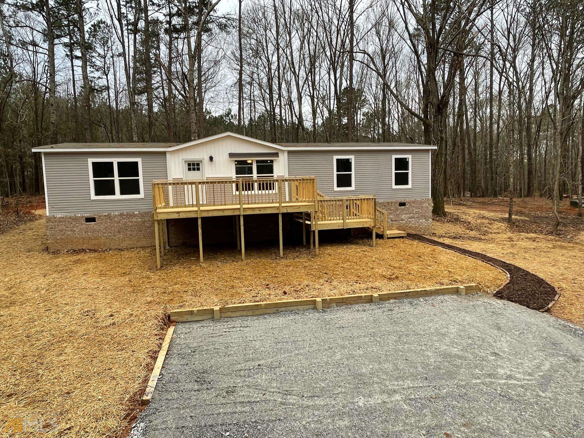 1371 Fraction Bottoms Road Buckhead, GA 30625 - Photo 1 of 1 a view of a house with a patio