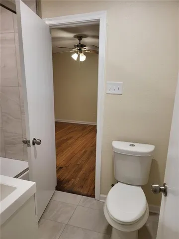 a bathroom with a toilet and a sink