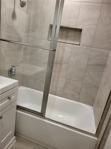a bathroom with a bathtub