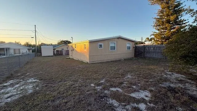 a house view with a backyard space
