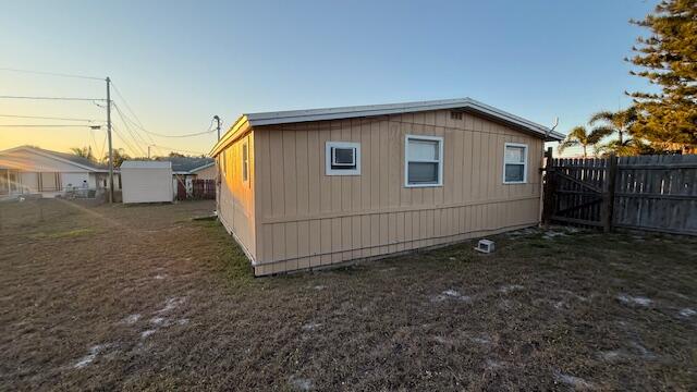 2234 Northeast Pine Ridge Street Jensen Beach, FL 34957 - Photo 15 of 18 a house view with a backyard space