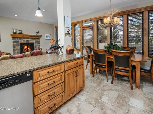 a very nice looking kitchen with a large window