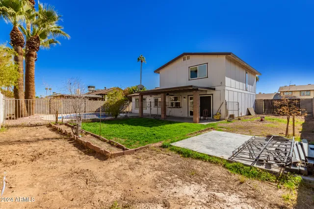 a view of pool with outdoor seating