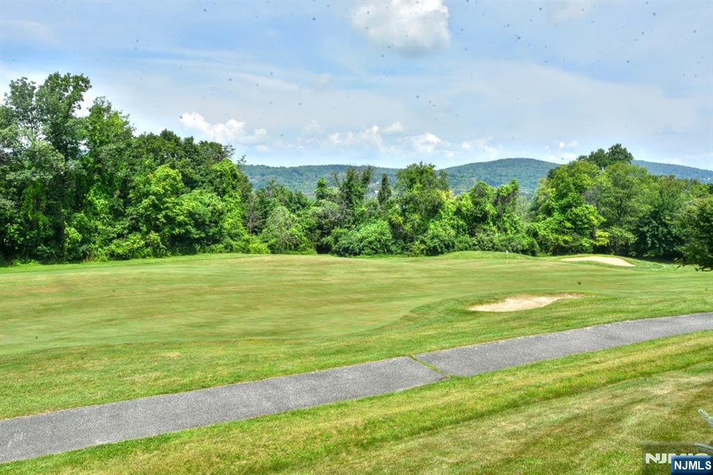 4 Acapulco Princess, Unit 8 Vernon, NJ 07462 - Photo 13 of 23 a view of a green field with clear sky