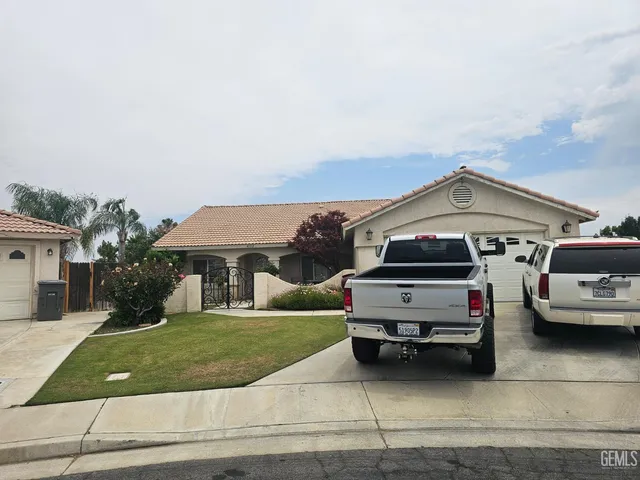a car parked in front of a house