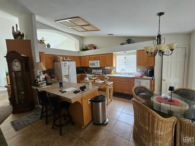 a view of a kitchen and dining room