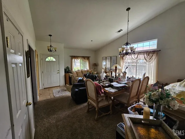 a view of a livingroom and dining room