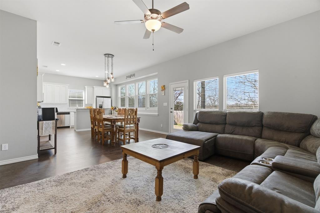 711 Hadley Lane Valley View, TX 76272 - Photo 7 of 40 Living area with ceiling fan, dark wood-style floors, and recessed lighting