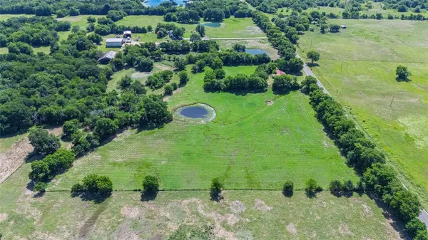 a view of a garden with a fountain