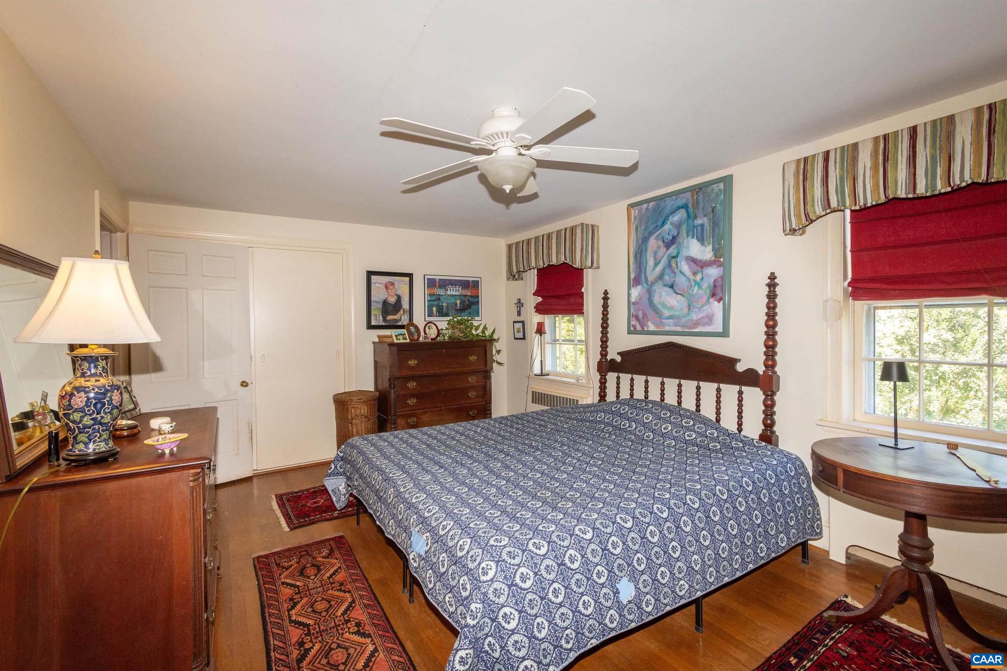 358 Main Street East Orange, VA 22960 - Photo 16 of 56 a living room with furniture and a table