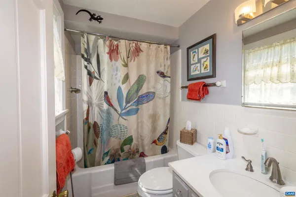 a bed room with a bed and a window