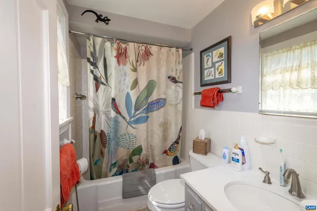 a bed room with a bed and a window