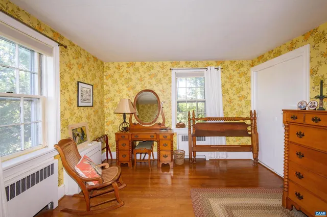 a bed room with a bed and a window