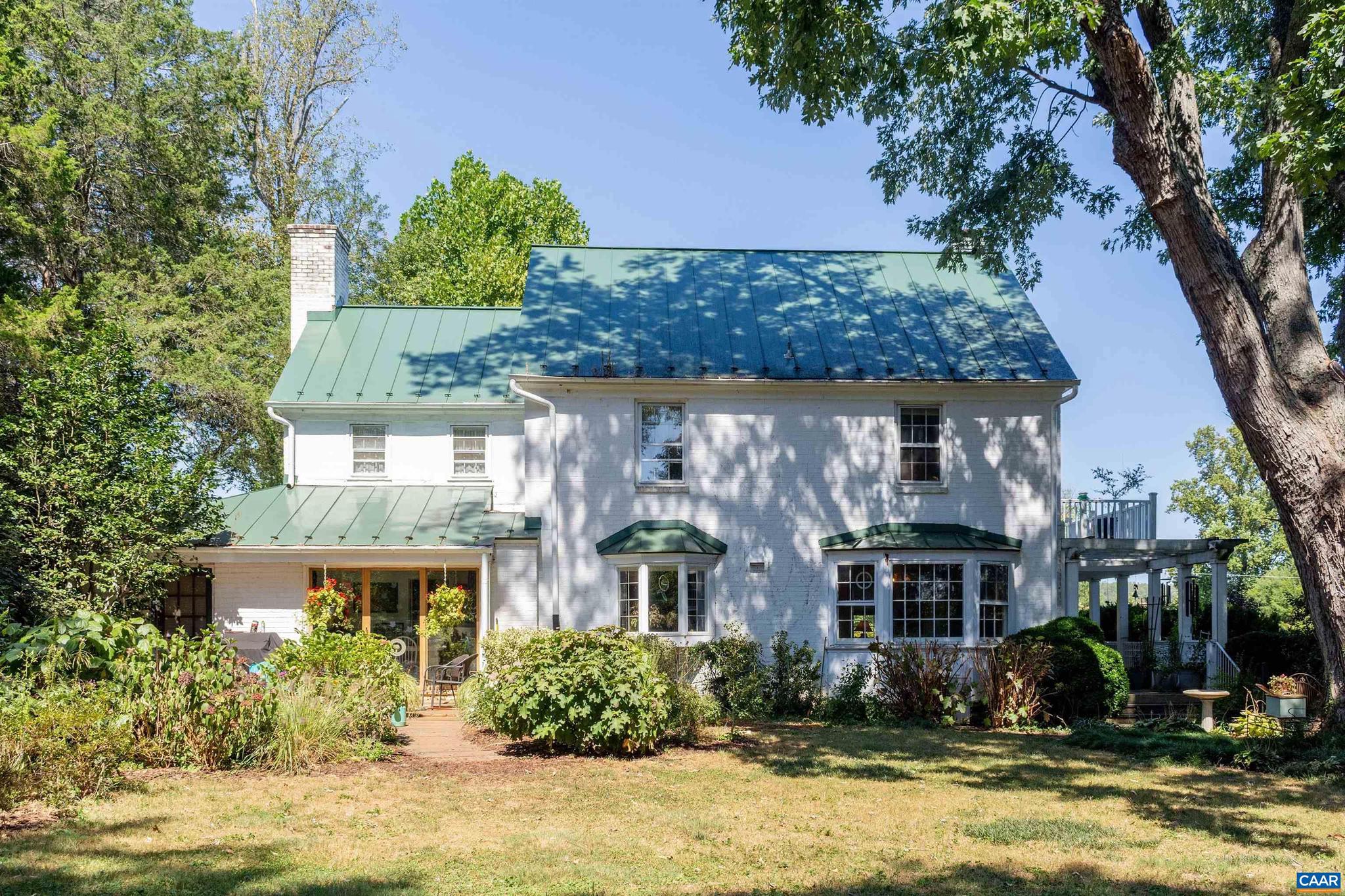 358 Main Street East Orange, VA 22960 - Photo 4 of 56 a front view of a house with a yard