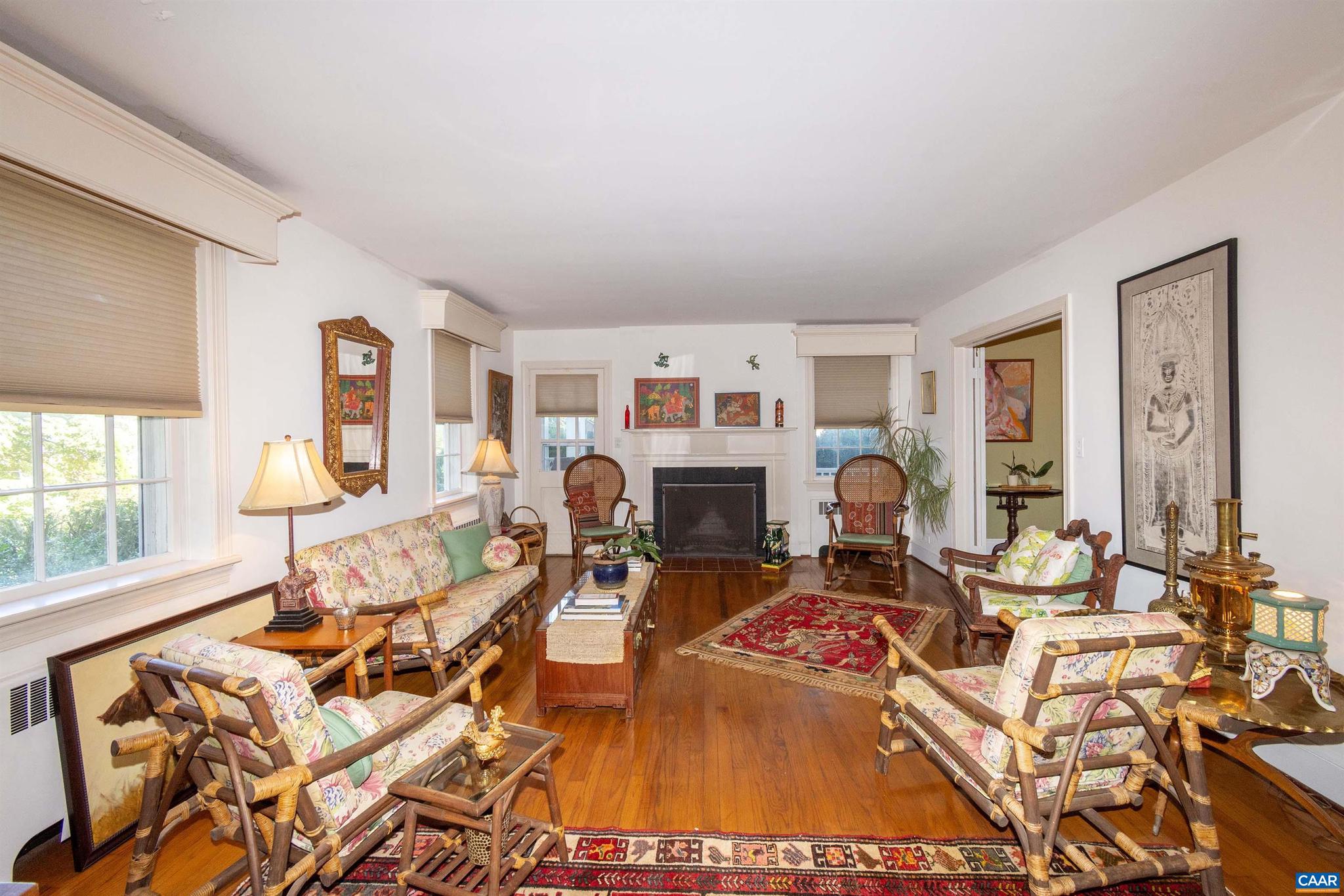 358 Main Street East Orange, VA 22960 - Photo 45 of 56 a living room with furniture a wooden floor and next to a window