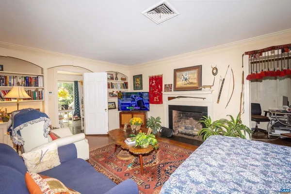 a bathroom with a toilet sink and window