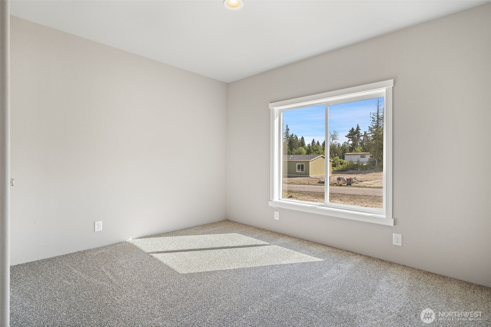 74 Butterfly Lane Sequim, WA 98382 - Photo 15 of 34 a view of an empty room with a window