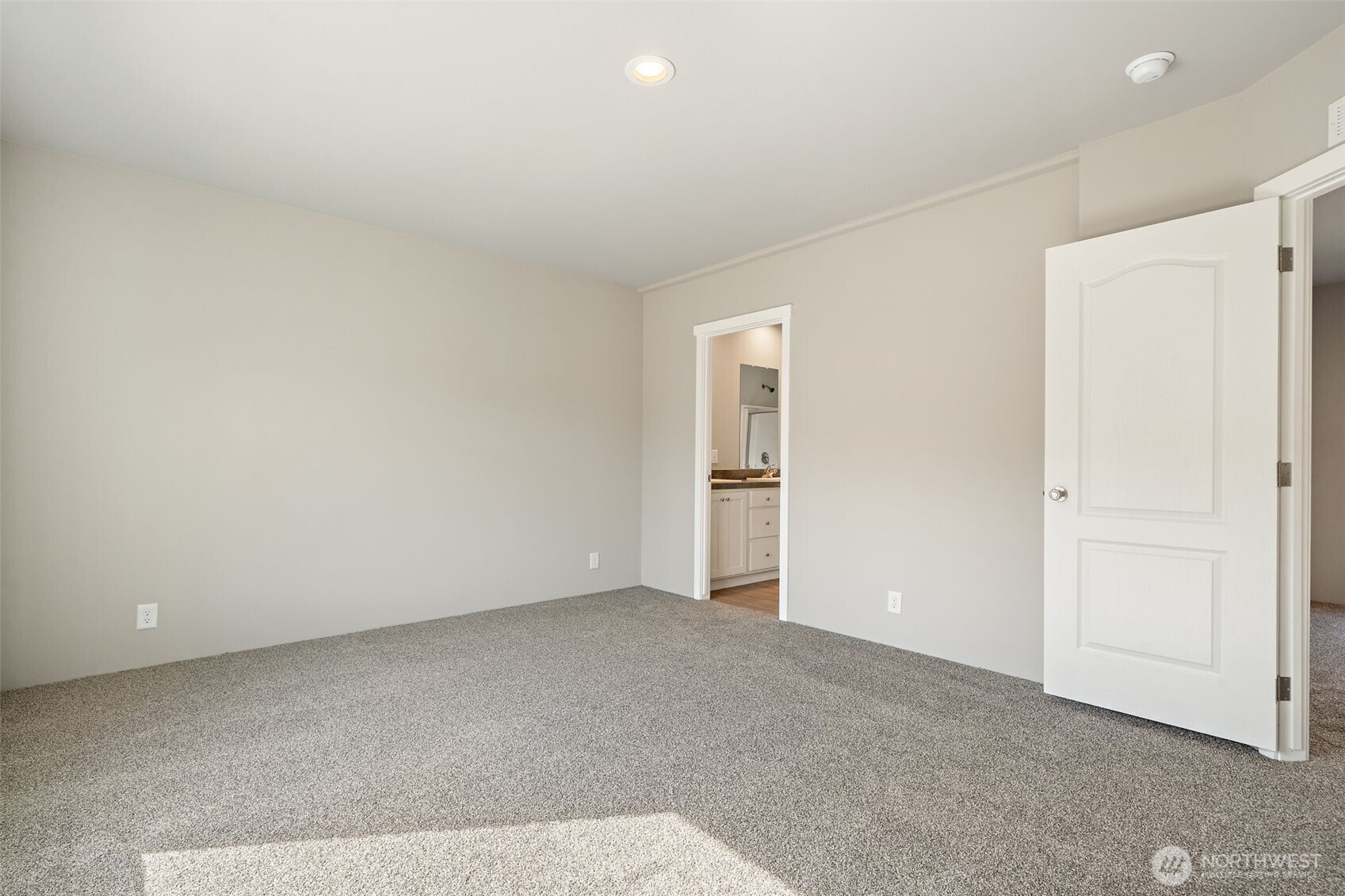 74 Butterfly Lane Sequim, WA 98382 - Photo 20 of 34 an empty room with closet and windows