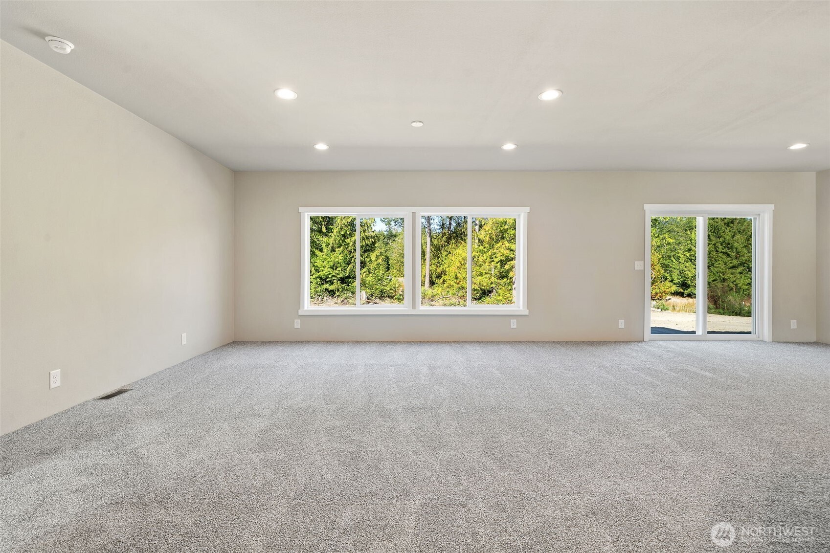 74 Butterfly Lane Sequim, WA 98382 - Photo 3 of 34 an empty room with windows