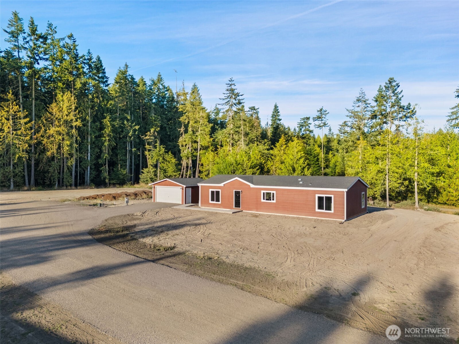 74 Butterfly Lane Sequim, WA 98382 - Photo 31 of 34 a view of an ocean with a house