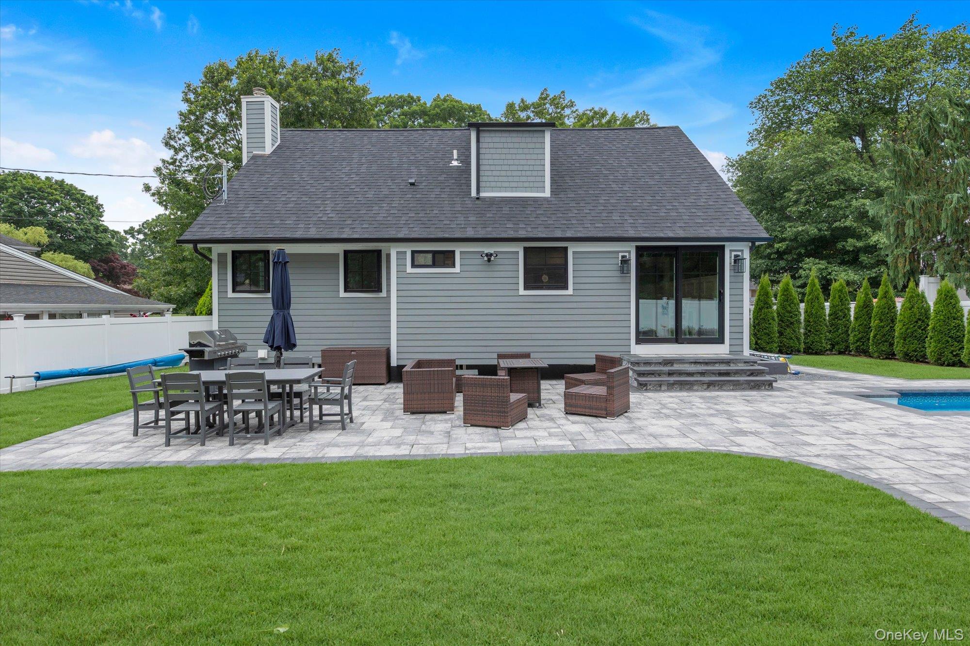 31 Apple Lane Commack, NY 11725 - Photo 20 of 28 Paved patio with plenty of space for dining and seating area.