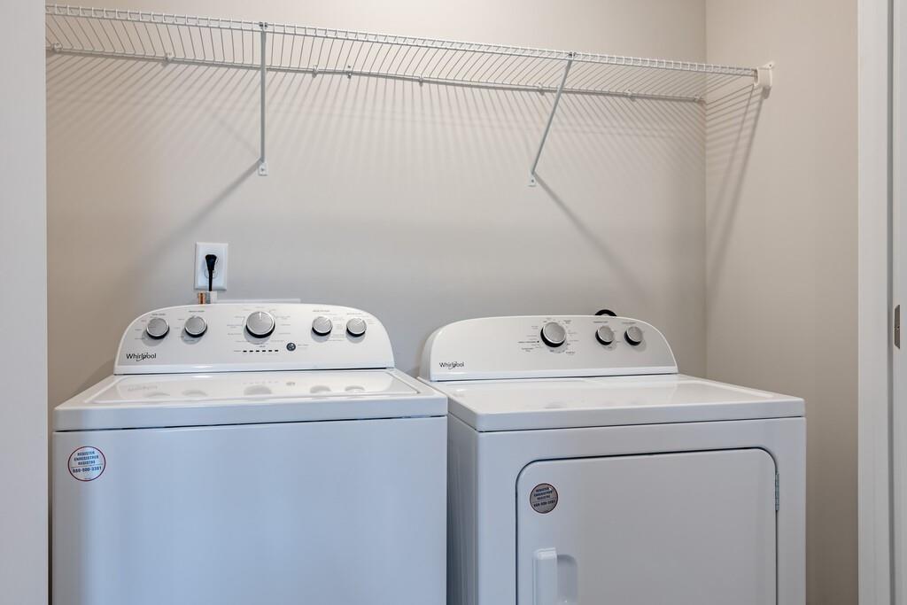 513 Kirkland Road, Unit CARRAWAY Covington, GA 30016 - Photo 19 of 53 a utility room with dryer and washer