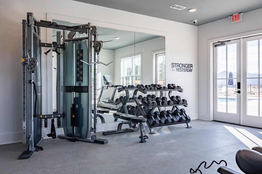 513 Kirkland Road, Unit CARRAWAY Covington, GA 30016 - Photo 26 of 53 a view of a room with gym equipment