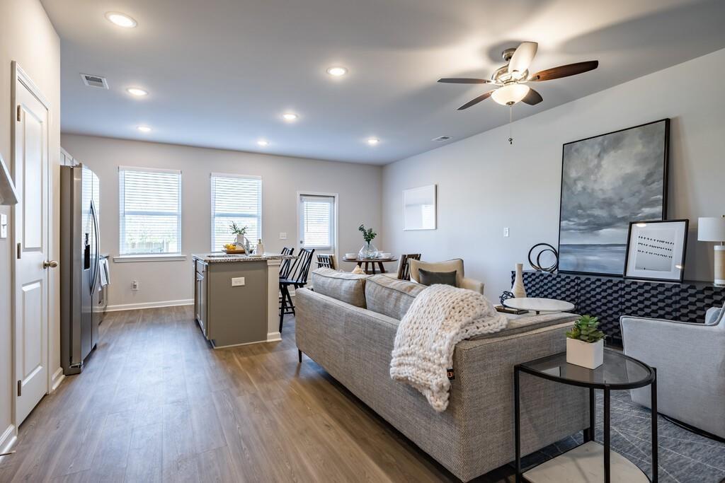 513 Kirkland Road, Unit CARRAWAY Covington, GA 30016 - Photo 6 of 53 a living room with furniture and view of kitchen